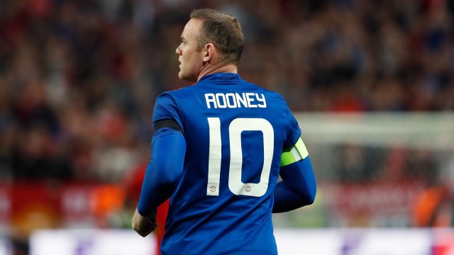 Wayne Rooney mengenakan kostum bernomor punggung 10 di Manchester United. (Foto: Odd Andersen/AFP)