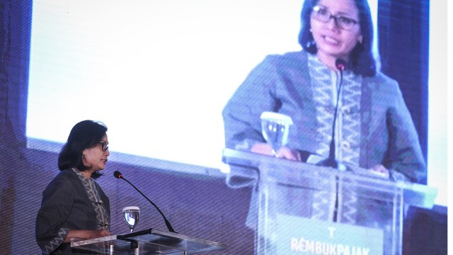 Menteri Keuangan Sri Mulyani Indrawati menyampaikan kata sambutan pada acara Rembuk Pajak di Jakarta, Senin (6/8). (Foto: ANTARA FOTO/Dhemas Reviyanto)