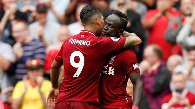 Firmino dan Mane rayakan gol di laga Liverpool vs West Ham. (Foto: REUTERS/Andrew Yates )