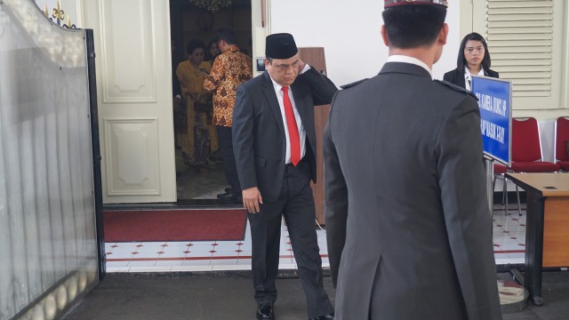 Wakapolri Komjen Pol Syafruddin dan Keluarga Tiba di Istana, Jakarta, Rabu (15/8/2018). (Foto:  Yudhistira Amran Saleh/kumparan)