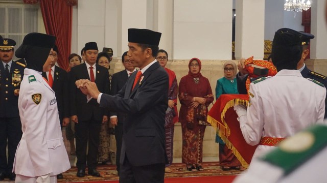 Jokowi kukuhkan Paskibraka 2018 di Istana Negara, Rabu (15/8/2018). (Foto: Yudhistira Amran Saleh/kumparan)