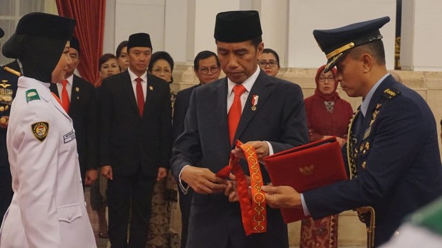 Jokowi kukuhkan Paskibraka 2018 di Istana Negara, Rabu (15/8/2018). (Foto: Yudhistira Amran Saleh/kumparan)