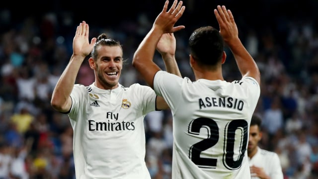 Selebrasi gol Bale dan Asensio. (Foto: REUTERS/Sergio Perez)
