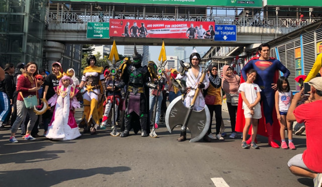 com-Para cosplayer yang mengenakan kostum karakter Hero di AOV  (Foto: ViaEight)