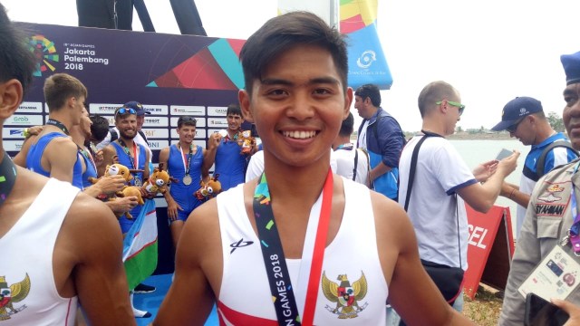 Rio Rizki Dermawan usai dapat emas di Asian Games 2018. (Foto: Alan Kusuma/kumparan)