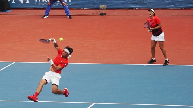 Tenis ganda campuran raih medali emas, Sabtu (25/8/2018). (Foto: Fanny Kusumawardhani/kumparan)