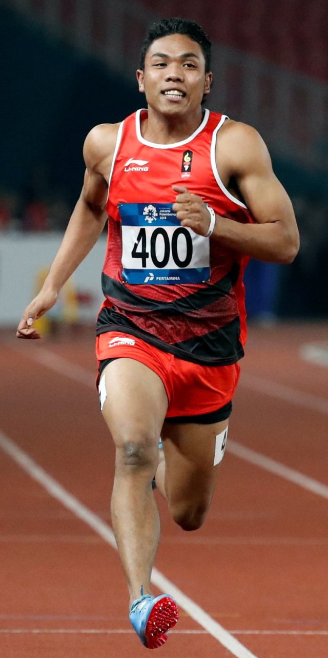 Lalu Muhammad Zohri berhasil menempati posisi pertama pada ronde 1, heat 3, kategori lari 100 meter putra. Foto: Reuters/Darren Whiteside