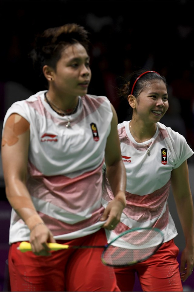 Apriyani (kiri) dan Greysia (kanan) di Asian Games 2018. (Foto: ANTARA FOTO/INASGOC/Puspa Perwitasari)