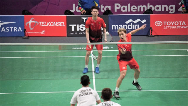 Atlet bulutangkis Indonesia, Fajar Alfian dan Muhammad Rian Ardianto melawan Atlet bulutangkis Indonesia, Marcus Gideon dan Kevin Sanjaya pada laga final ganda putra