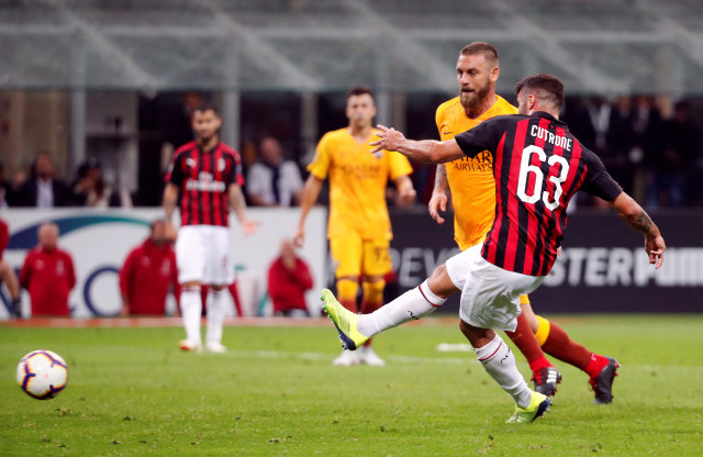 Cutrone cetak gol kedua Milan di laga vs Roma. (Foto: REUTERS/Stefano Rellandini)