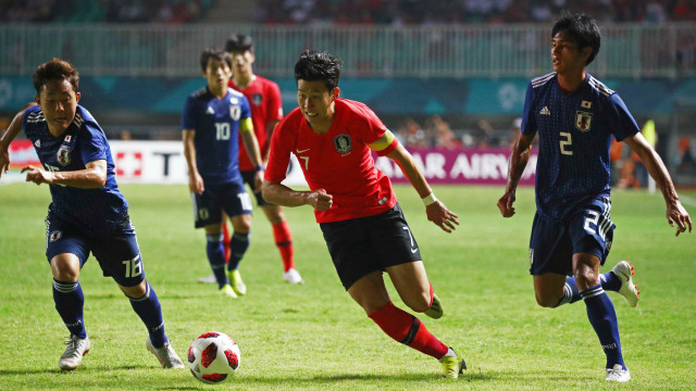 Perebutan medali emas sepak bola, Korea Selatan vs Jepang. (Foto: REUTERS/Athit Perawongmetha)
