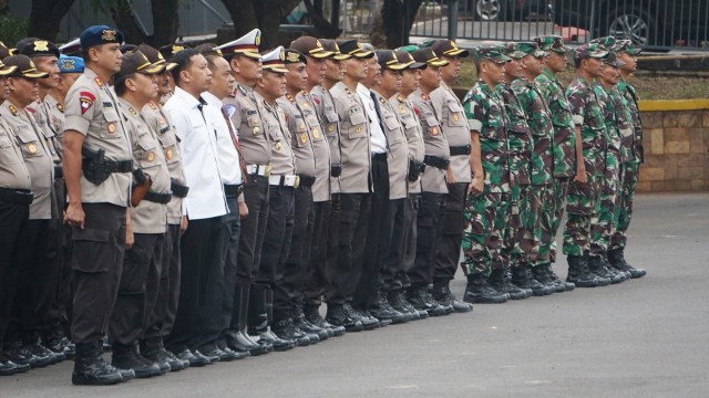 Polri dan TNI melaksanakan Apel Konsolidasi Berakhirnya Pengamanan Asian Games di Polda Metro Jaya, Jakarta, Rabu (5/9/2018). (Foto: Jamal Ramadhan/kumparan)