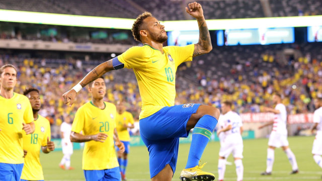 Neymar melakukan selebrasi usai mencetak gol ke gawang Amerika Serikat. (Foto: USA Today/Reuters/Brad Penner)