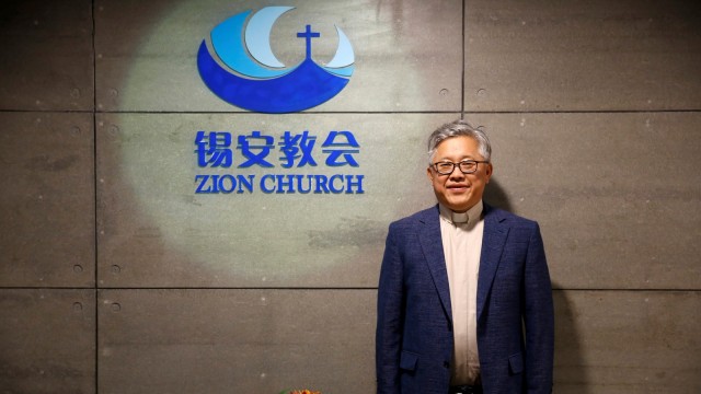 Kepala pendeta dari gereja Zion di Beijing, Jin Mingri. (Foto: Reuters/Thomas Peter)