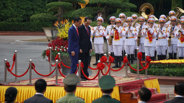 Penyambutan Presiden Joko Widodo dan Iriana di Istana Kepresidenan Vietnam. (Foto: Yudhistira Amran Saleh/kumparan)