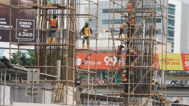 Pekerja infrastruktur di Jakarta, Rabu (12/9/2018). Foto: Helmi Afandi Abdullah/kumparan