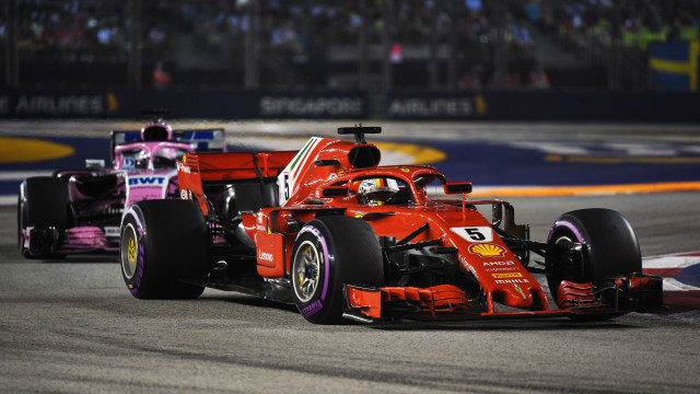 Sebastian Vettel di GP Singapura 2018. (Foto: Manan VATSYAYANA / AFP)