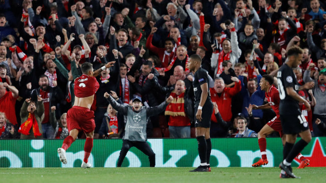 Firmino merayakan gol penentu kemenangan Liverpool atas PSG di injury time. (Foto: REUTERS/Phil Noble)