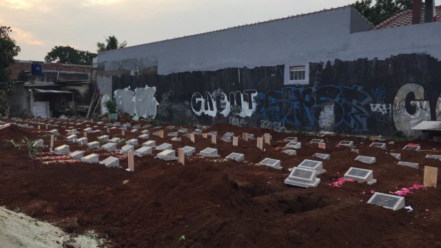 Makam di TPU Grogol, Jl Pulo Mangga, Grogol, Limo, Depok. (Foto: Muhammad Lutfan/kumparan)