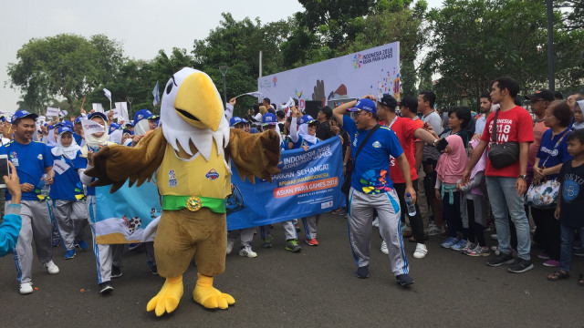 Suasana Parade Momo Asian Para Games di Monas, Jakarta, Minggu (23/9/2018). (Foto: Moh Fajri/kumparan)