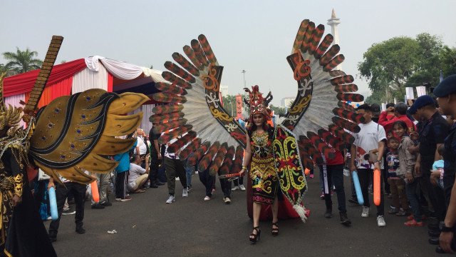 Suasana Parade Momo Asian Para Games di Monas, Jakarta, Minggu (23/9/2018). (Foto: Moh Fajri/kumparan)