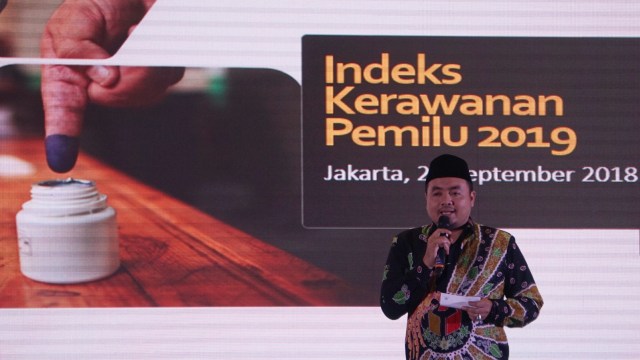 Anggota Bawaslu RI, Mochammad Afifuddin, memberikan presentasi di acara launching Indeks Kerawanan Pemilu (IKP) 2019 di Jakarta, Selasa (25/9/2018). (Foto: Fanny Kusumawardhani/kumparan)