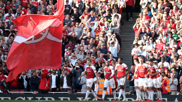 Para pemain Arsenal merayakan gol Mesut Oezil ke gawang Watford. (Foto: Reuters/Peter Cziborra)