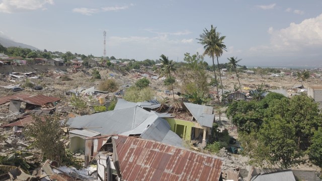 Pemukiman yang hancur akibat gempa bumi di wilayah Balaroa, Palu, Sulawesi Tengah. (Foto: Jamal Ramadhan/kumparan)