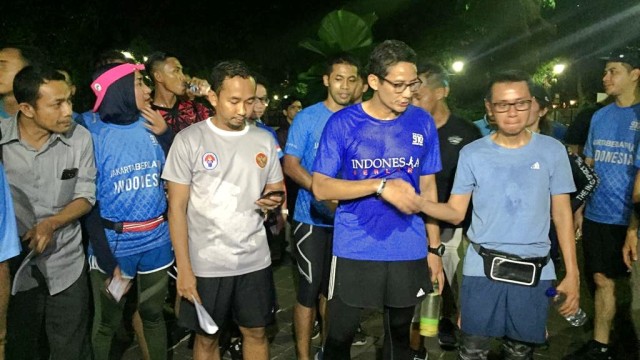 Sandi mengadakan Charity Night Run untuk korban gempa dan tsunami Donggala dan Palu. (Foto: Paulina Herasmaranindar/kumparan)