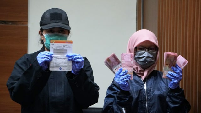Barang bukti OTT pegawai Dirjen Pajak di Ambon. (Foto: Nugroho Sejati/kumparan)