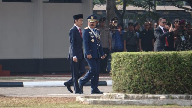 Presiden Jokowi tiba di Mabes TNI Cilangkap dalam rangka HUT TNI ke-73, Jumat (5/10/2018). (Foto: Helmi Afandi Abdullah/kumparan)