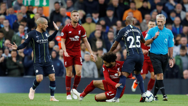 Liverpool dan City harus puas dengan hasil imbang. (Foto: REUTERS/Phil Noble)