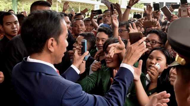 Presiden Jokowi saat menghadiri Dies Natalis ke-66 Universitas Sumatera Utara, Senin (8/10/2018). (Foto: Dok. Biro Pers Setpres/Rusman )