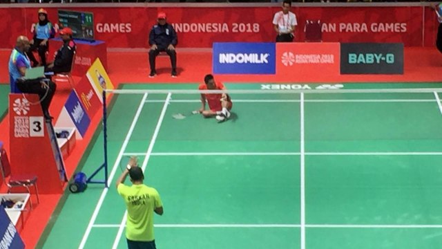Ukun Rukaendi, atlet badminton Indonesia saat bertanding dalam Asian Para Games 2018. (Foto: Sandi Firdaus/kumparan)