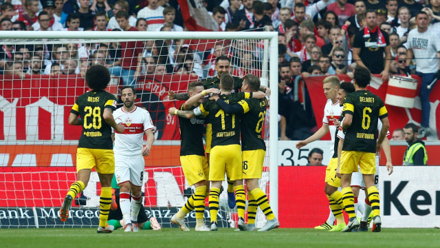 Para pemain Dortmund merayakan gol. (Foto: REUTERS/Ralph Orlowski)