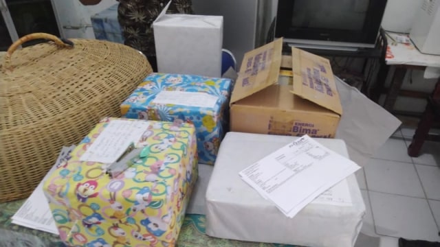 Paket kue kering berisikan ganja. (Foto: Dok. Ditnarkoba Polda Aceh )