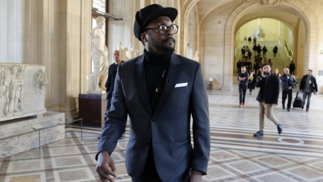 Will.i.am anggota Black Eyed Peas. (Foto: AFP/FRANCOIS GUILLOT)