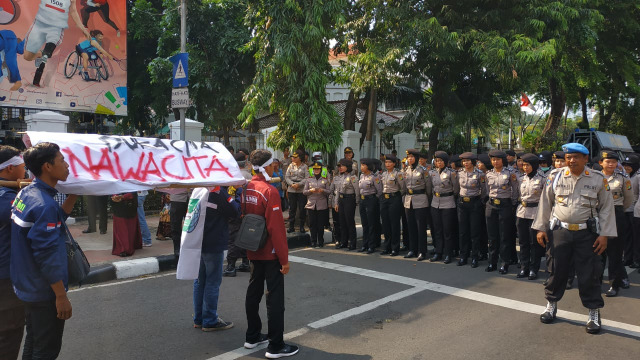 Demo KAMMI "empat tahun Pemerintahan Jokowi-JK" di Jalan Medan Merdeka Barat. (Foto: Maulana Ramadhan/kumparan)