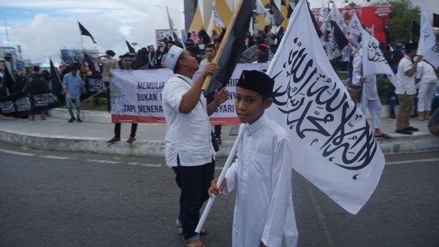 Unjuk Rasa Bela Bendera Tauhid di Aceh, Massa Minta Banser Taubat. (Foto: Zuhri Noviandi/kumparan)
