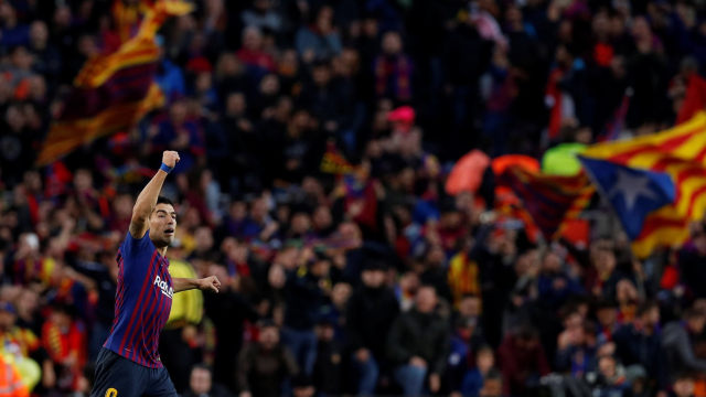 Suarez merayakan gol yang dia cetak. (Foto: REUTERS/Albert Gea)