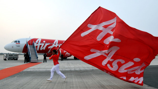 Ilustrasi Air Asia. (Foto: AFP/ADEK BERRY)