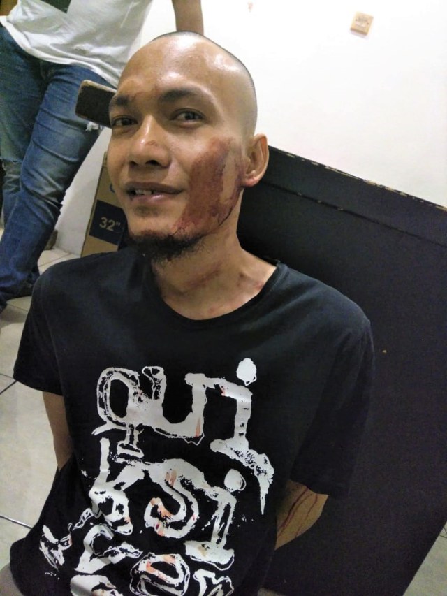 Rohandi, pria yang menyerang polisi di Polsek Penjaringan, Jumat (9/11/2018). (Foto: istimewa)
