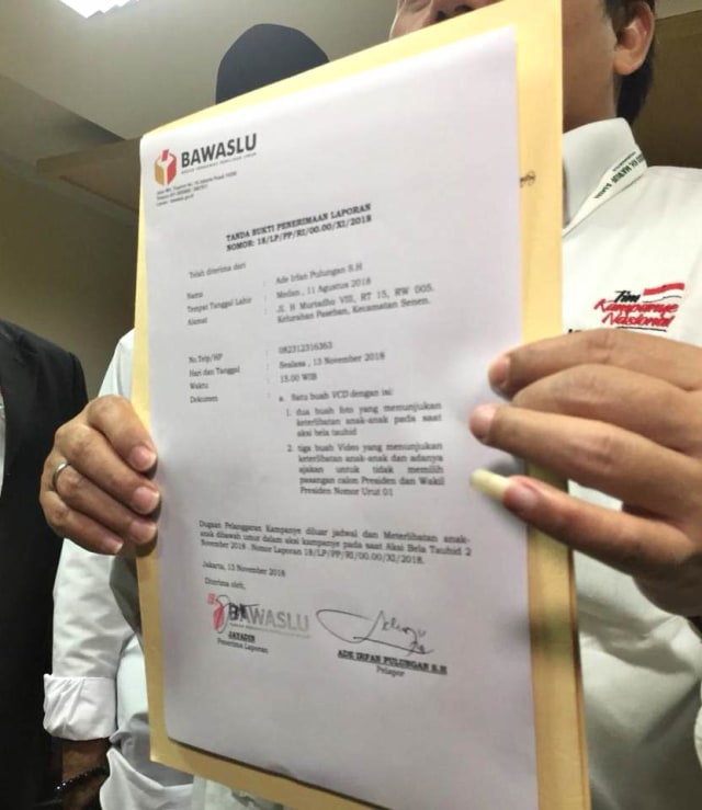 Surat tanda bukti penerimaan laporan dugaan pelanggaran kampanye dari TKN Jokowi-Ma’ruf ke Bawaslu. (Foto: Mirsan Simamora/kumparan)