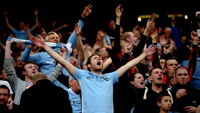 Suporter Manchester City di Derbi Manchester 23 Oktober 2011. (Foto: Laurence Griffiths/Getty Images)