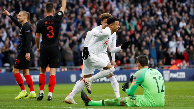 Jesse Lingard merayakan gol ke gawang Kroasia. (Foto: REUTERS/Darren Staples)