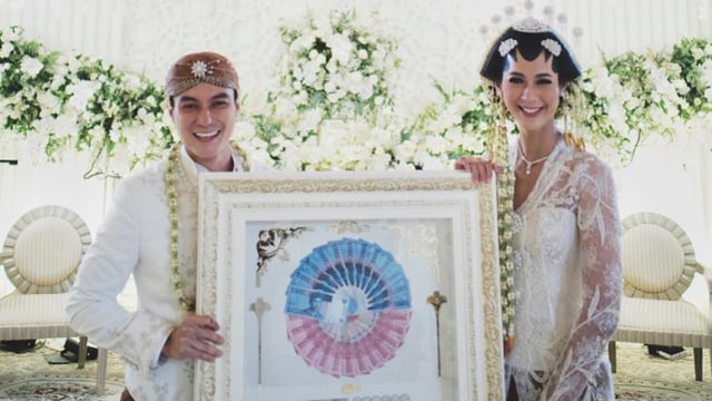 Baim Wong dan Paula Verhouven resmi menikah. (Foto: Instagram @weddingku)