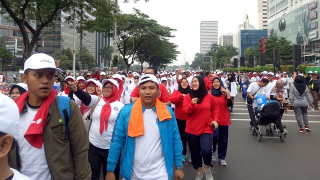 Menteri Muhadjir Effendy peringati Hari Guru Nasional dengan jalan sehat Kemendikbud, Minggu (25/11/2018). (Foto: Lolita Claudia/kumparan)