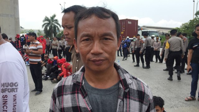 Ketua Federasi Buruh Transportasi Pelabuhan Indonesia (FBTPI-KPBI), Abdul Rosyid. (Foto:  Fachrul Irwinsyah/kumparan)