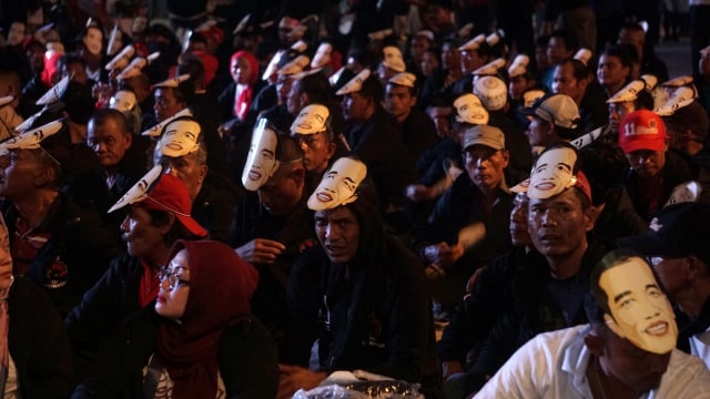 Suasana pelantikan "7000 Jokowi" di Pergudangan Olympic Bogorindo. (Foto: Iqbal Firdaus/kumparan)