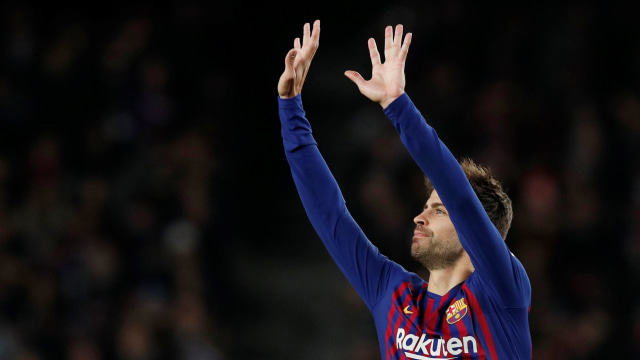 Gerard Pique usai cetak gol untuk Barcelona. (Foto: REUTERS/Albert Gea)